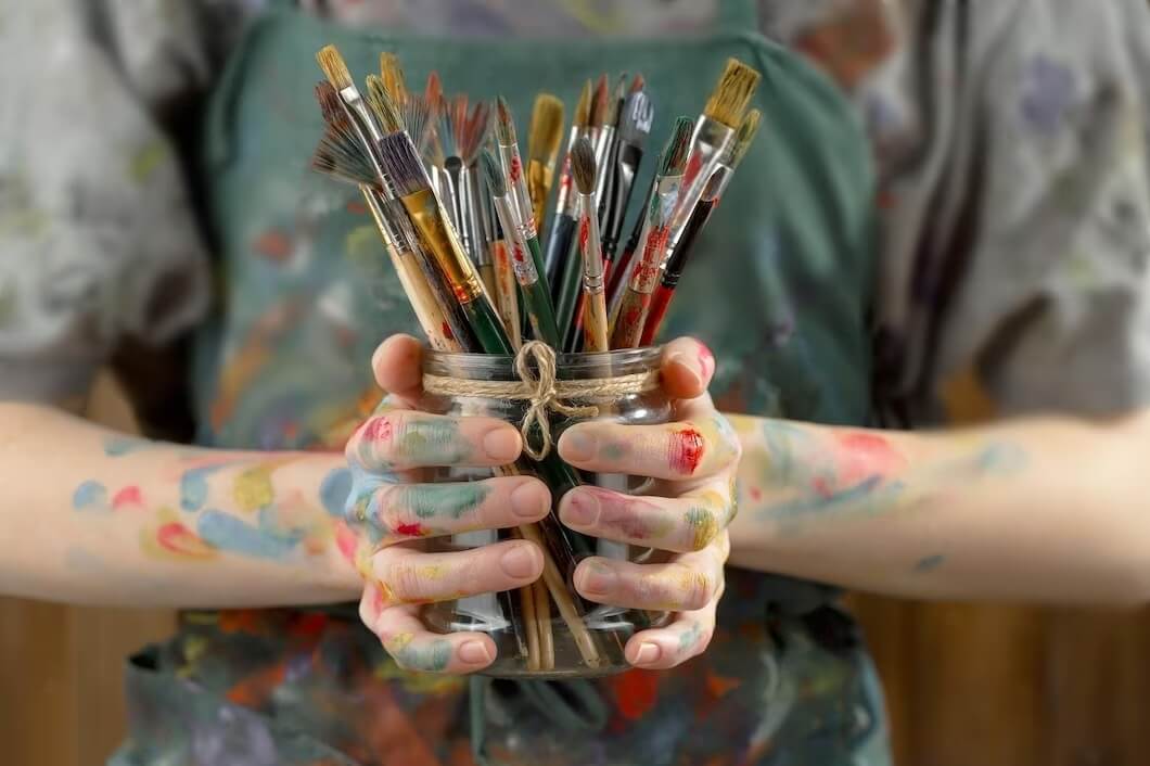 Artist hands with paint